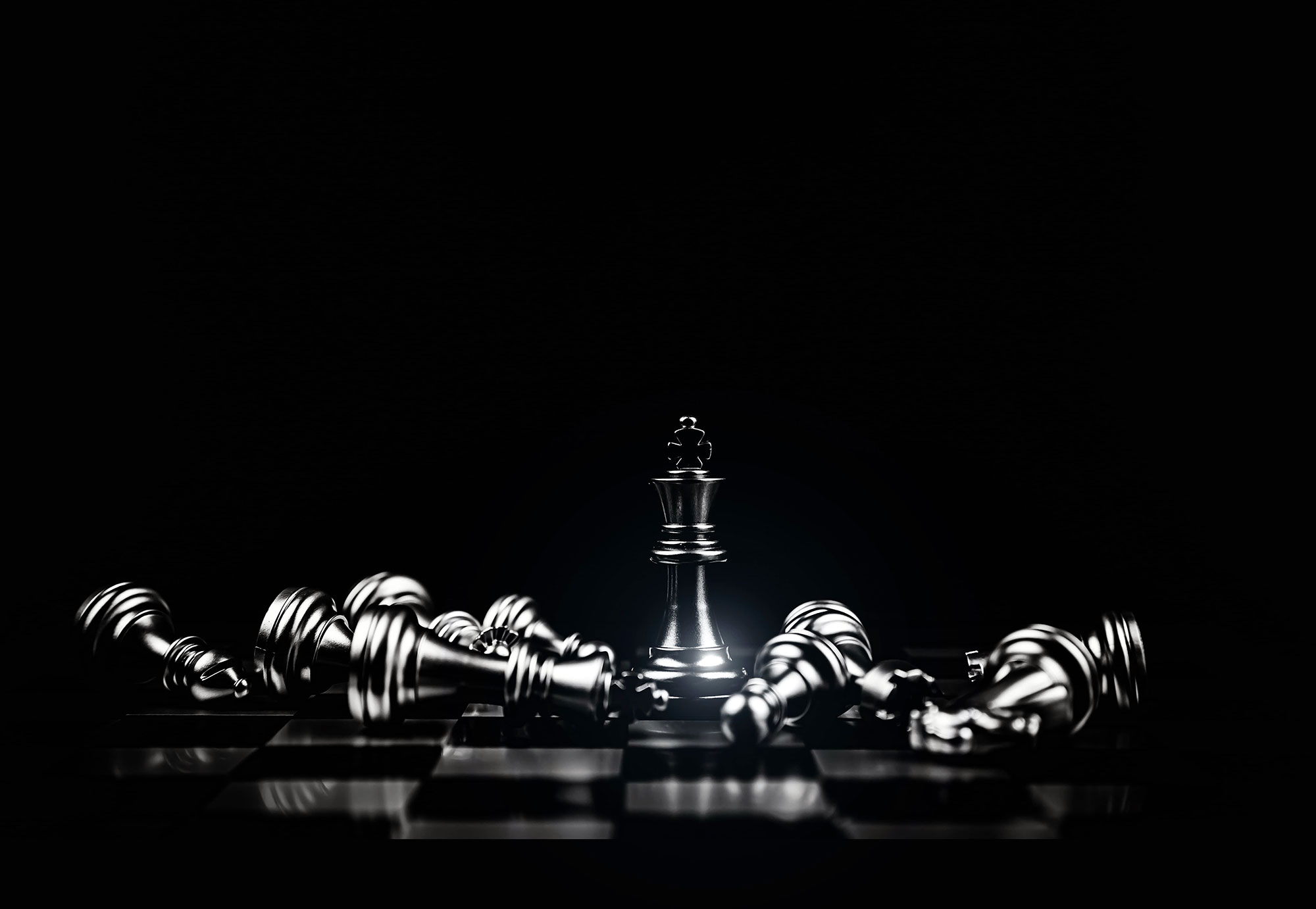 close-up-king-chess-standing-winner-with-falling-chess